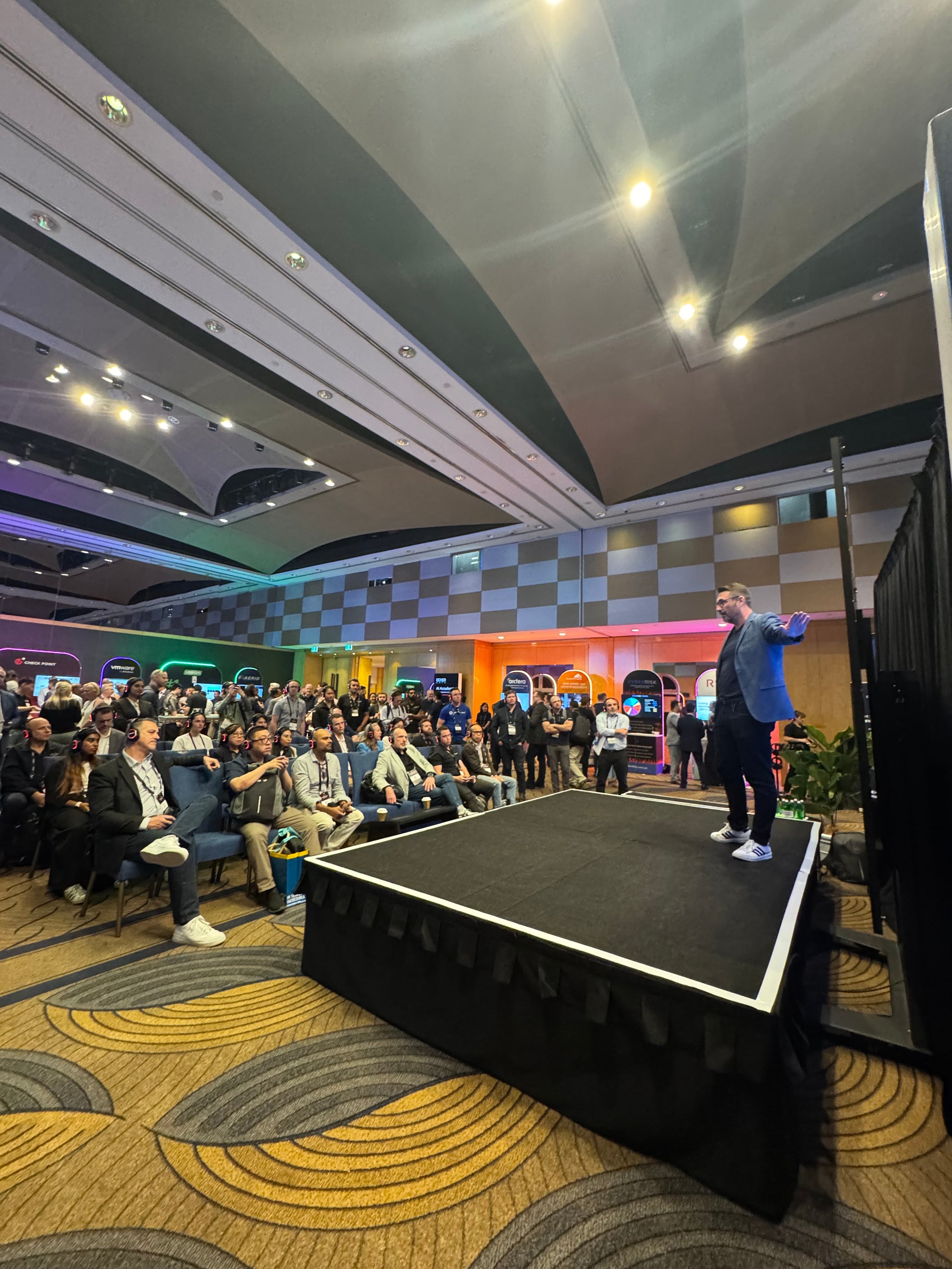 Andrew Riley presenting to an audience